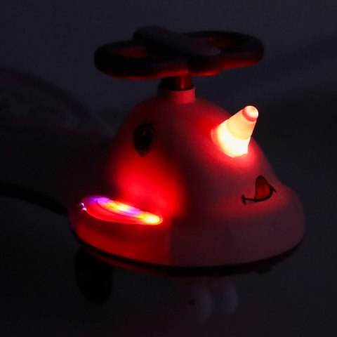Nowoczesny jeździk z rączką LED Swing FIX - różowy skuter dla dzieci